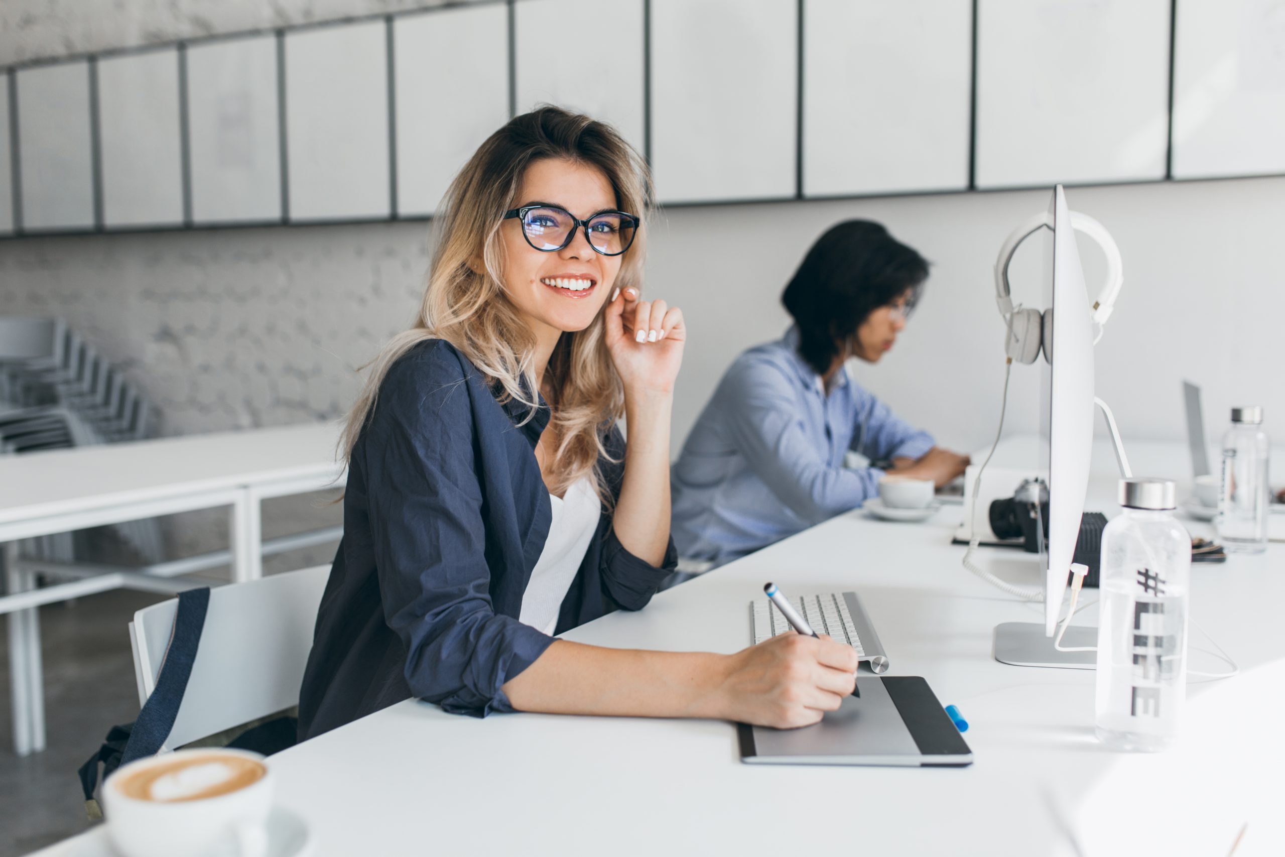 beautiful-female-office-worker-carrying-out-administrative-work-company-scaled