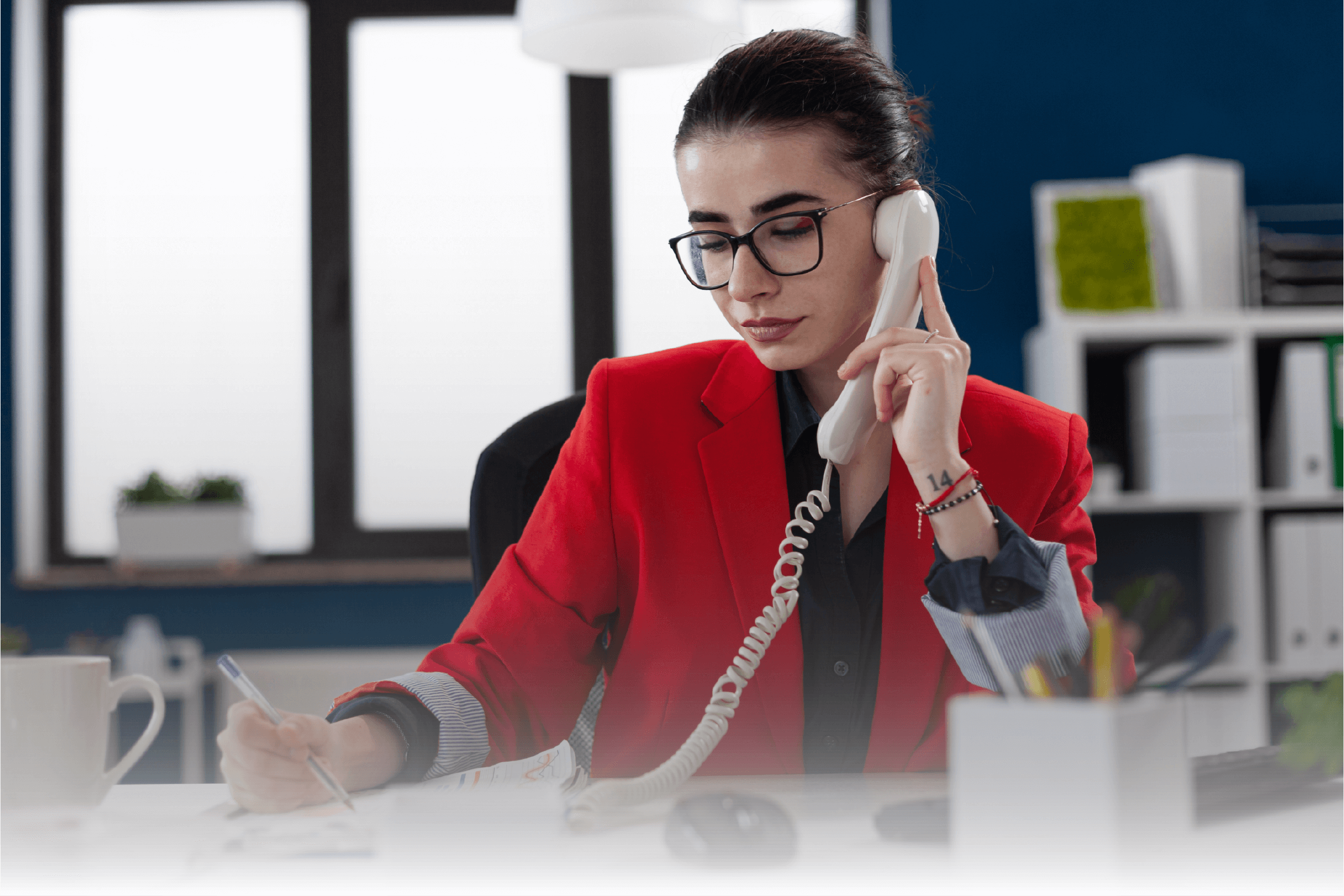 businesswoman-taking-notes-clipboard-sitting-desk-corporate-office-while-taking
